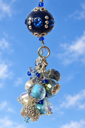 Blue balloon accessory against an open sky