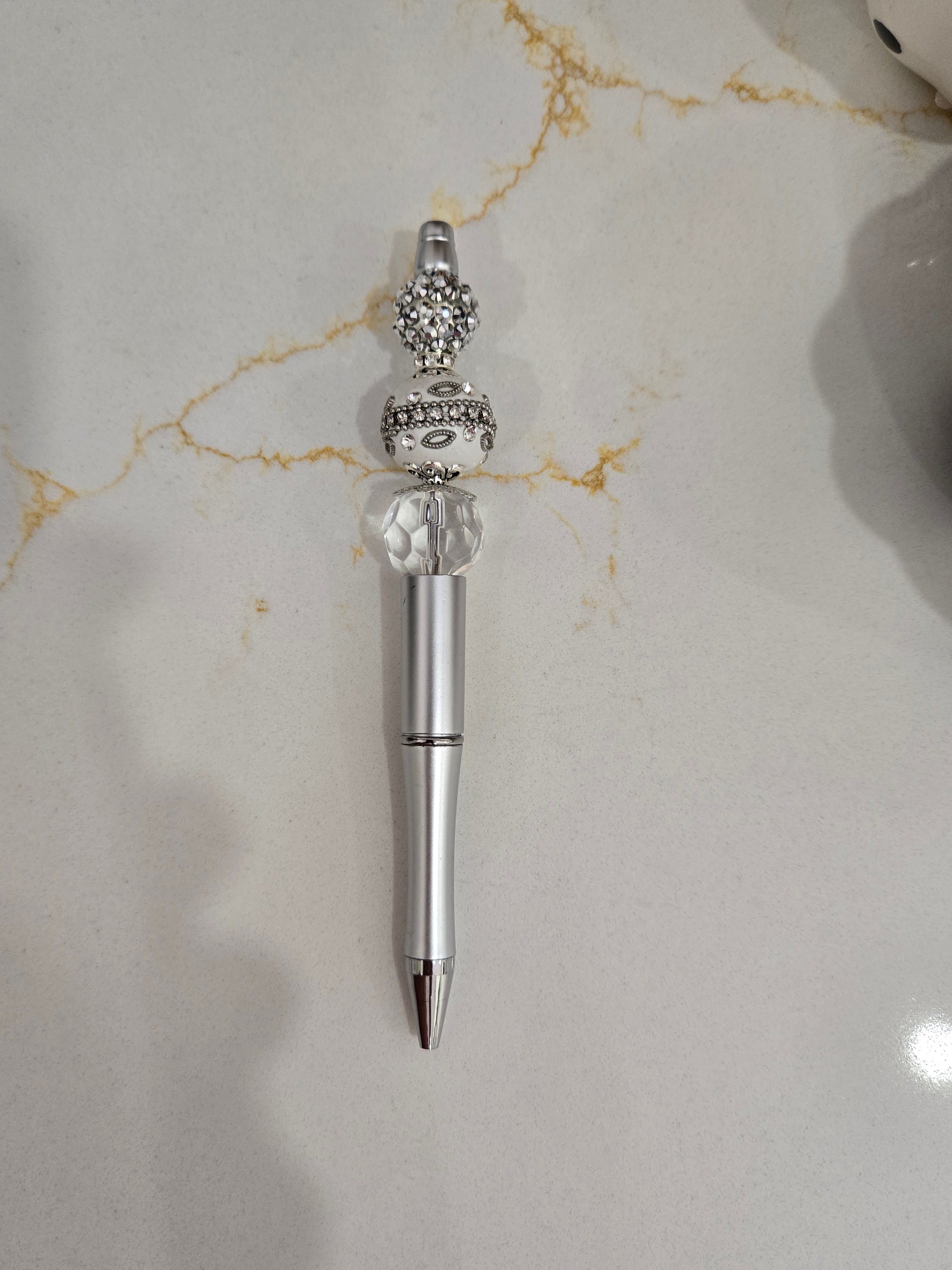 Silver and white beaded pen