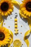 Yellow Zipper Pull sunny flat lay